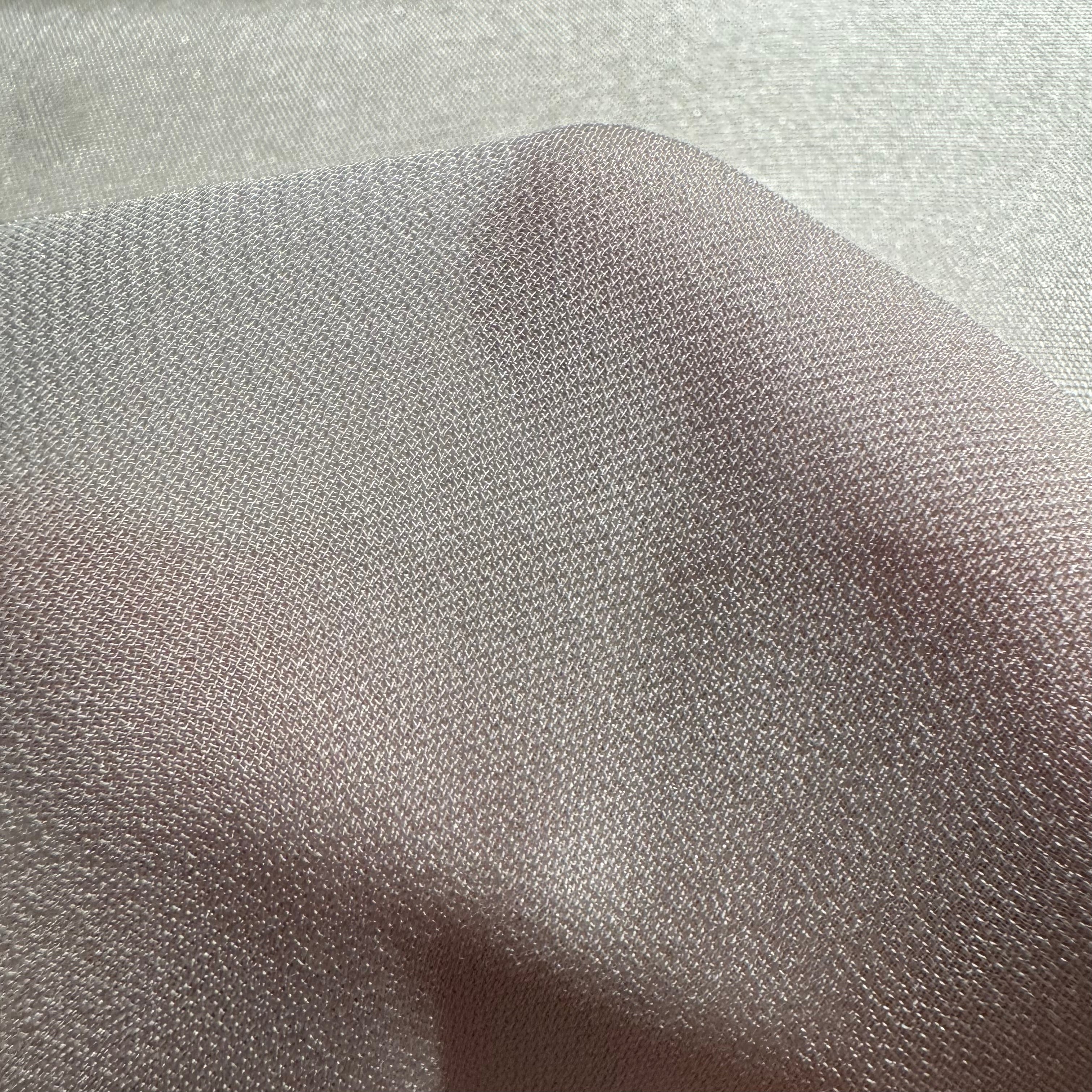 Close-up of white silk georgette fabric texture