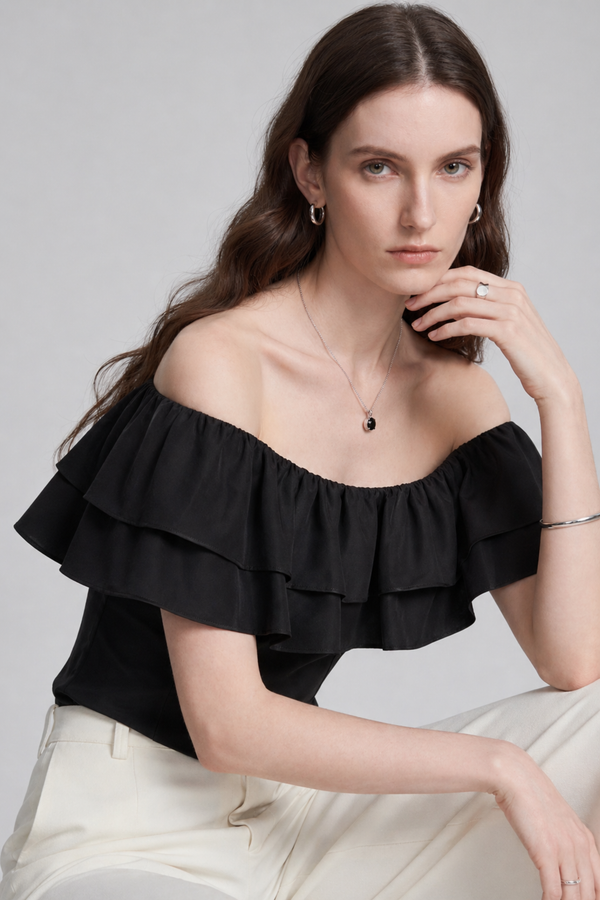 Ruth Top by VKELLER in Black Carbon. 100% silk off-shoulder top with gathered neckline and ruffled detail. Designed in Paris, handcrafted in Portugal. #carbon