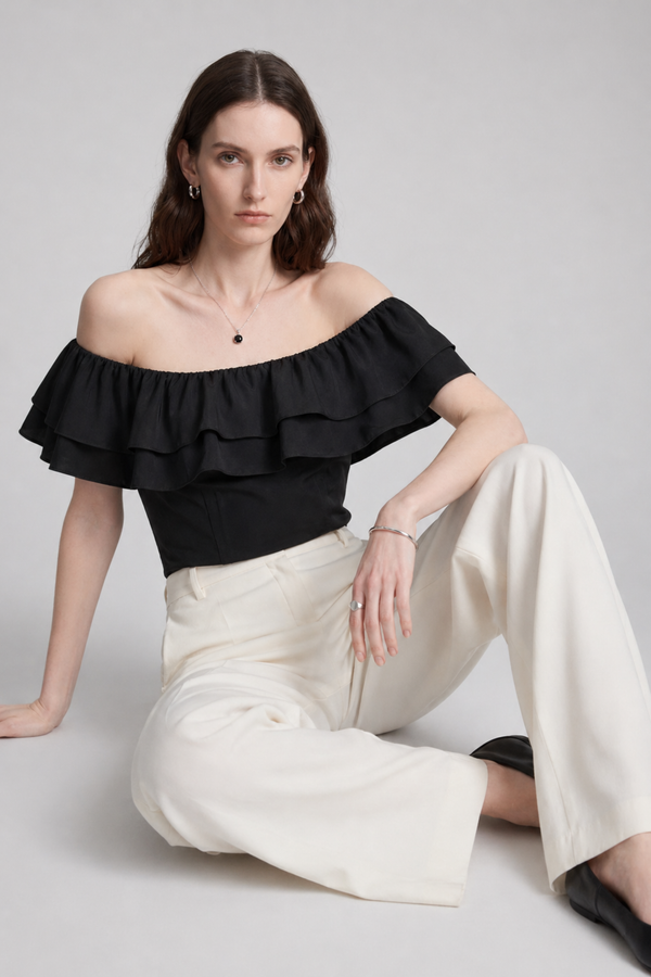 Ruth Top by VKELLER in Black Carbon. 100% silk off-shoulder top with gathered neckline and ruffled detail. Designed in Paris, handcrafted in Portugal. #carbon