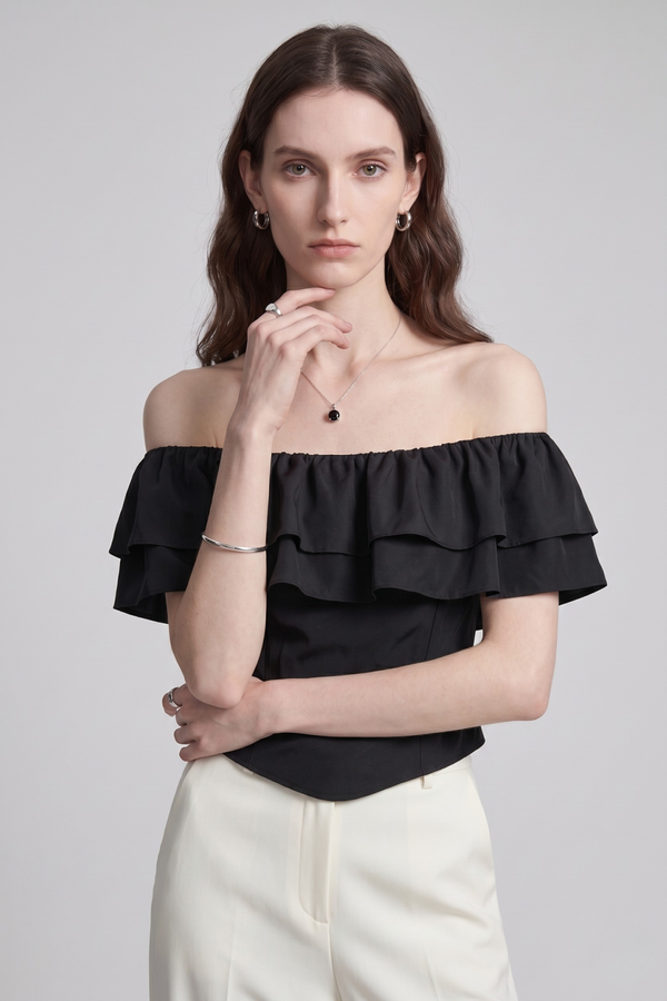 Ruth Top by VKELLER in Black Carbon. 100% silk off-shoulder top with gathered neckline and ruffled detail. Designed in Paris, handcrafted in Portugal. #carbon