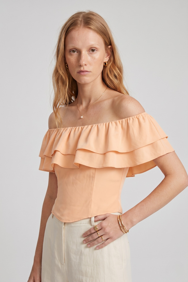 Ruth Top by VKELLER in Orange Peach. 100% silk off-shoulder top with gathered neckline and ruffled detail. Designed in Paris, handcrafted in Portugal. #peach