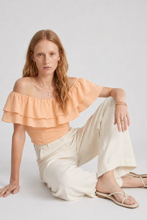 Ruth Top by VKELLER in Orange Peach. 100% silk off-shoulder top with gathered neckline and ruffled detail. Designed in Paris, handcrafted in Portugal. #peach