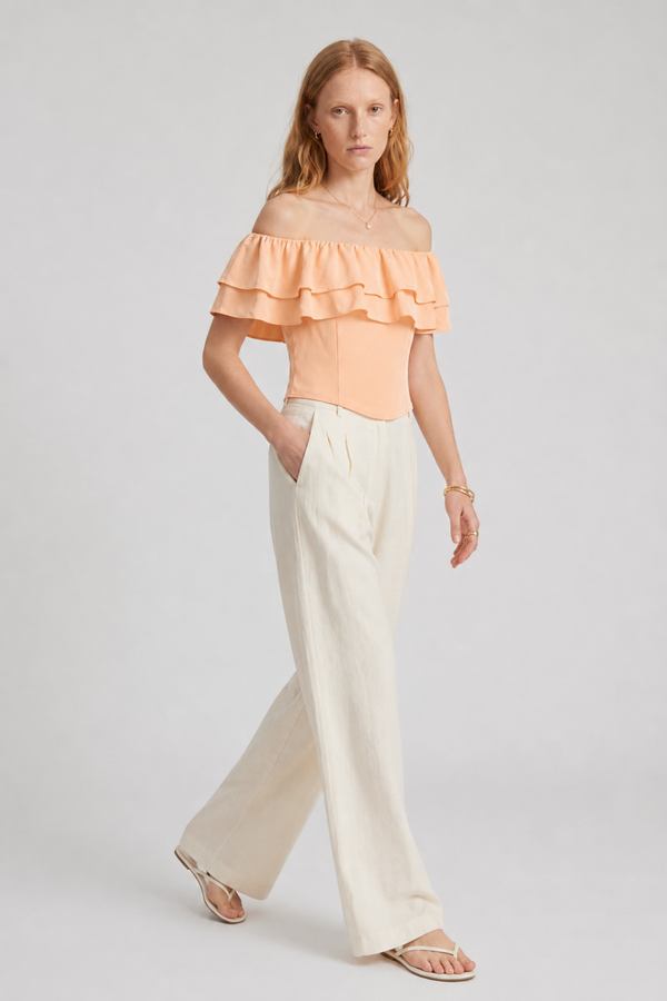 Ruth Top by VKELLER in Orange Peach. 100% silk off-shoulder top with gathered neckline and ruffled detail. Designed in Paris, handcrafted in Portugal. #peach