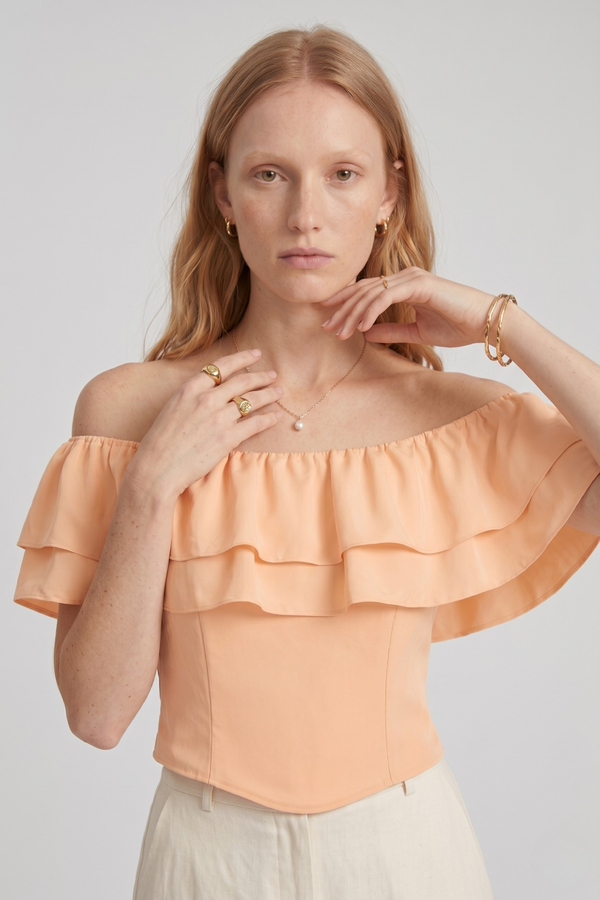 Ruth Top by VKELLER in Orange Peach. 100% silk off-shoulder top with gathered neckline and ruffled detail. Designed in Paris, handcrafted in Portugal. #peach