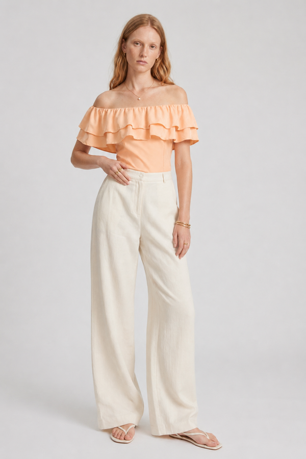 Ruth Top by VKELLER in Orange Peach. 100% silk off-shoulder top with gathered neckline and ruffled detail. Designed in Paris, handcrafted in Portugal. #peach