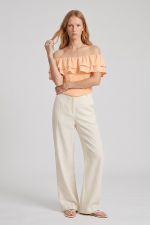 Ruth Top by VKELLER in Orange Peach. 100% silk off-shoulder top with gathered neckline and ruffled detail. Designed in Paris, handcrafted in Portugal. #peach