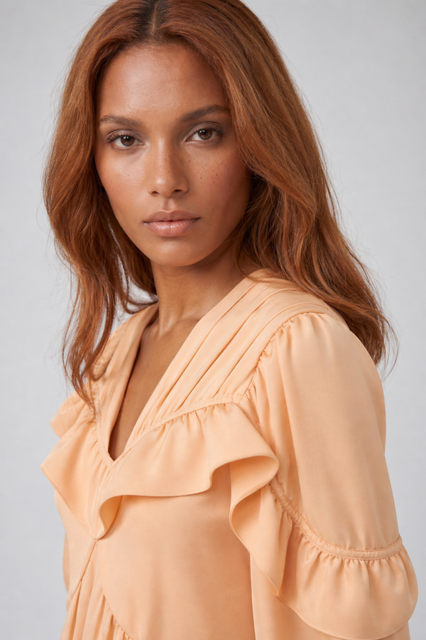 Samara Top by VKELLER in Orange Peach. 100% silk bohemian blouse with ruffled long sleeves and gathered neckline. Designed in Paris, handcrafted in Portugal. #peach