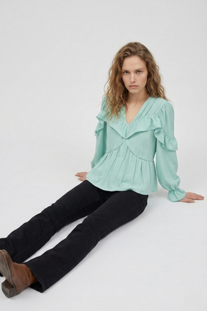 Samara Top by VKELLER in Turquoise Soothing Sea. 100% silk bohemian blouse with ruffled long sleeves and gathered neckline. Designed in Paris, handcrafted in Portugal. #soothingsea