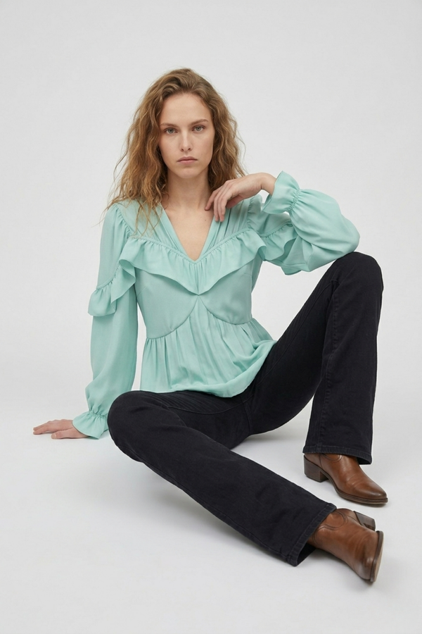 Samara Top by VKELLER in Turquoise Soothing Sea. 100% silk bohemian blouse with ruffled long sleeves and gathered neckline. Designed in Paris, handcrafted in Portugal. #soothingsea