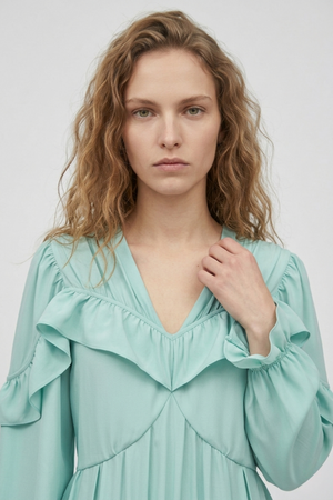 Samara Top by VKELLER in Turquoise Soothing Sea. 100% silk bohemian blouse with ruffled long sleeves and gathered neckline. Designed in Paris, handcrafted in Portugal. #soothingsea