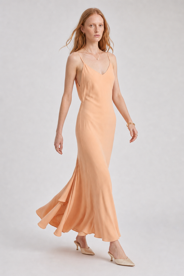Vikki Maxi Dress by VKELLER in Orange Peach. 100% silk maxi dress with low back and flowing bias-cut silhouette. Designed in Paris, handcrafted in Portugal. #peach