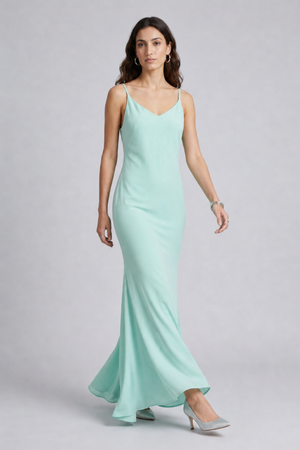 Vikki Maxi Dress by VKELLER in Turquoise Soothing Sea. 100% silk maxi dress with low back and flowing bias-cut silhouette. Designed in Paris, handcrafted in Portugal. #soothingsea