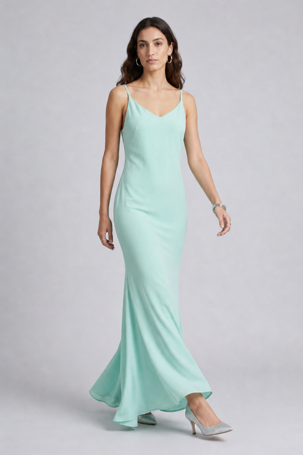 Vikki Maxi Dress by VKELLER in Turquoise Soothing Sea. 100% silk maxi dress with low back and flowing bias-cut silhouette. Designed in Paris, handcrafted in Portugal. #soothingsea