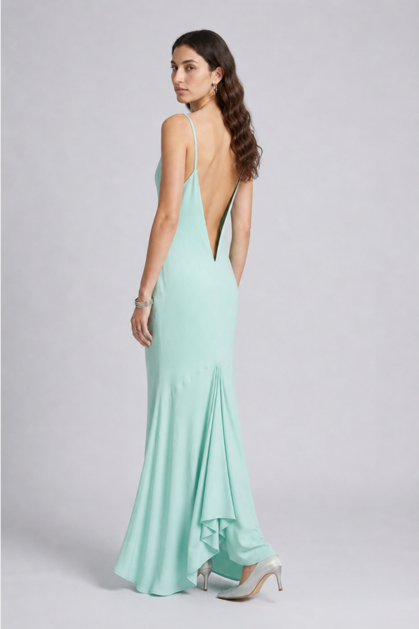 Vikki Maxi Dress by VKELLER in Turquoise Soothing Sea. 100% silk maxi dress with low back and flowing bias-cut silhouette. Designed in Paris, handcrafted in Portugal. #soothingsea